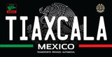 A novelty Mexican license plate style graphic reading 'TIAXCALA' in large white letters on a black background, with the Mexican coat of arms behind it, 'MEXICO' and 'TRANSPORTE PRIVADO AUTOMOVIL' below, plus green and red stripes and small emblem marks in the corners.